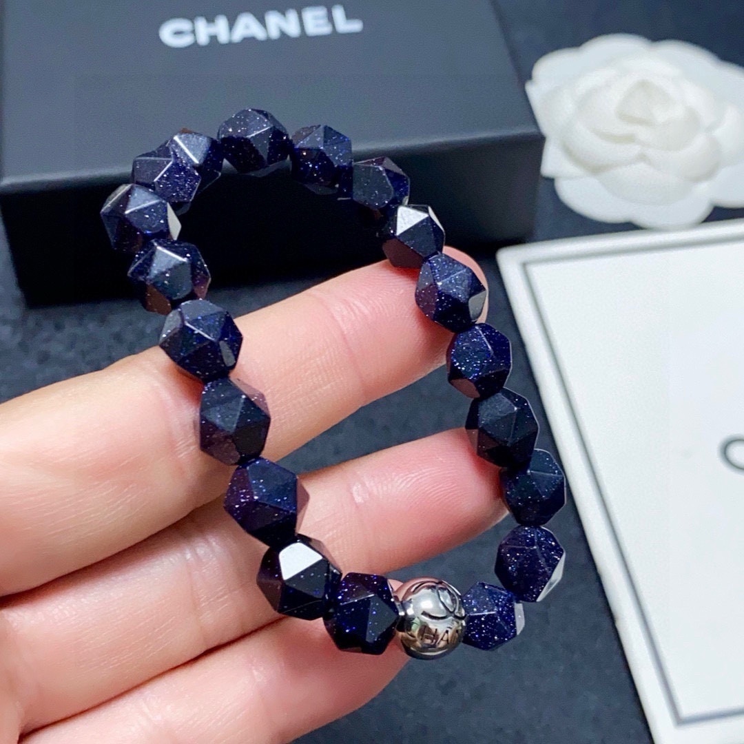 Blue Sandstone Faceted Bead Bracelet with Silver Logo Charm