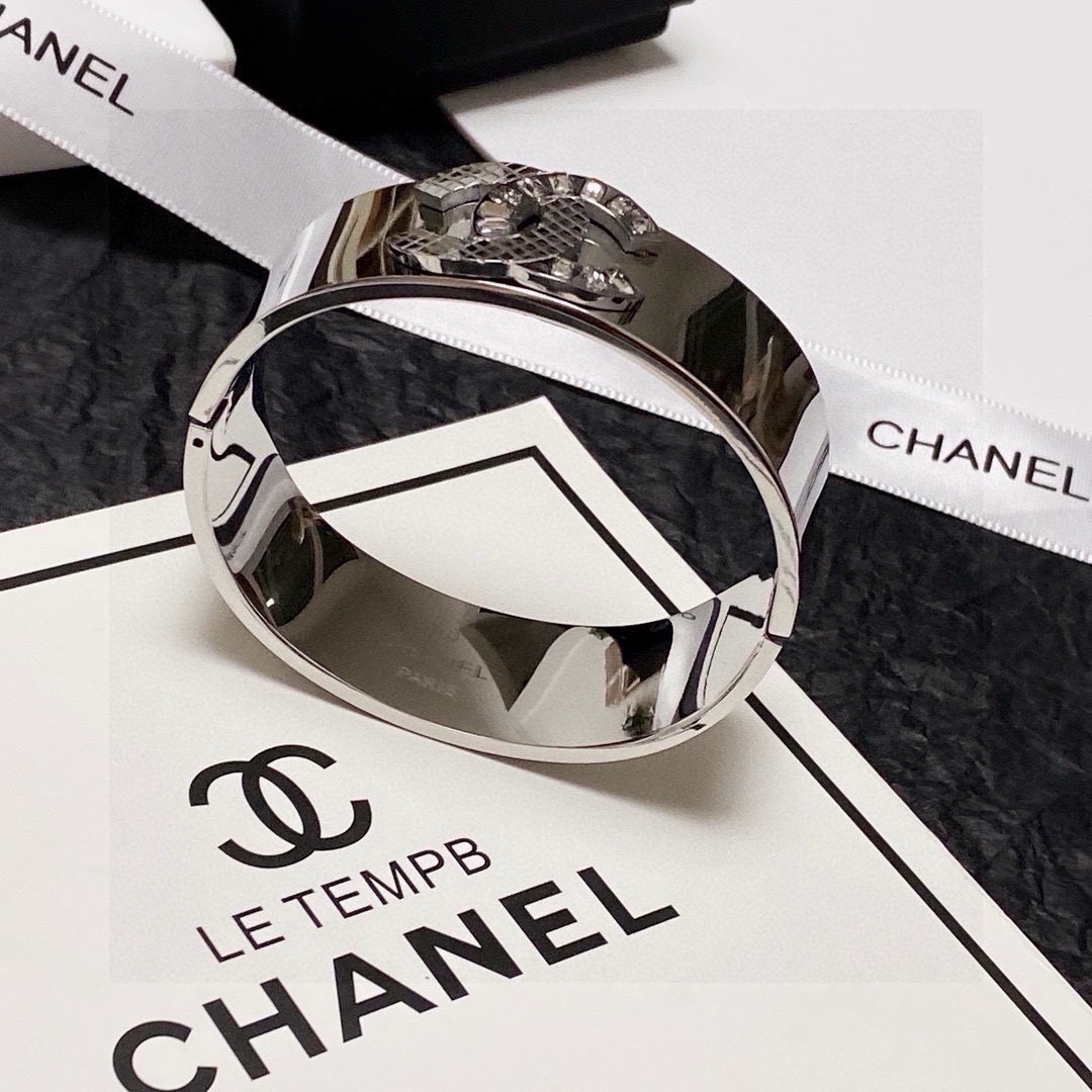 Luxury Chanel Silver Bangle Bracelet - Quilted Crystal CC Logo
