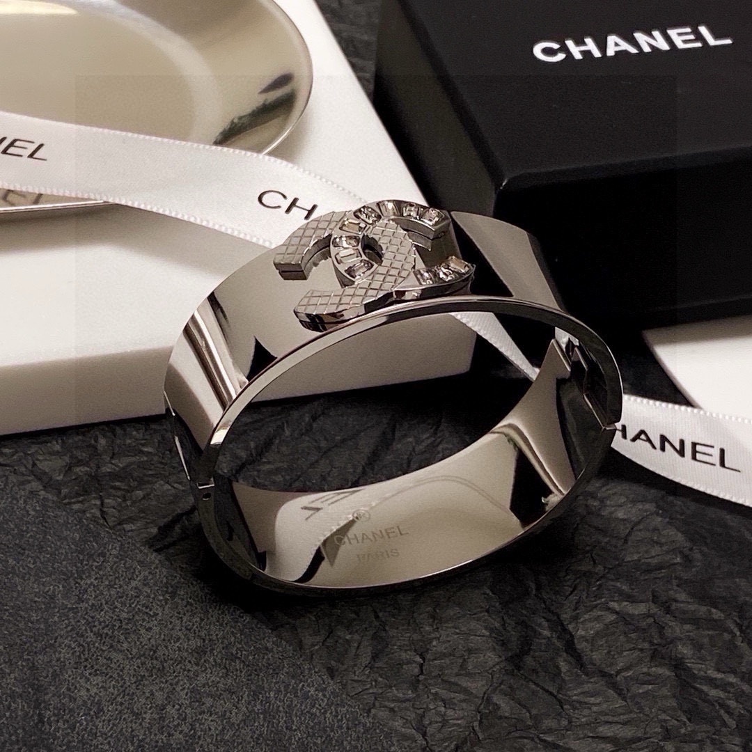 Luxury Chanel Silver Bangle Bracelet - Quilted Crystal CC Logo