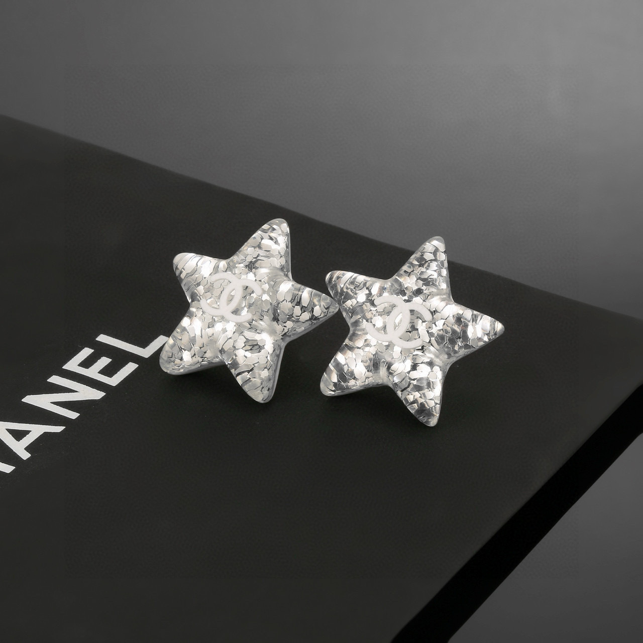 Luxury Silver Glitter Star Stud Earrings with Iconic CC Logo