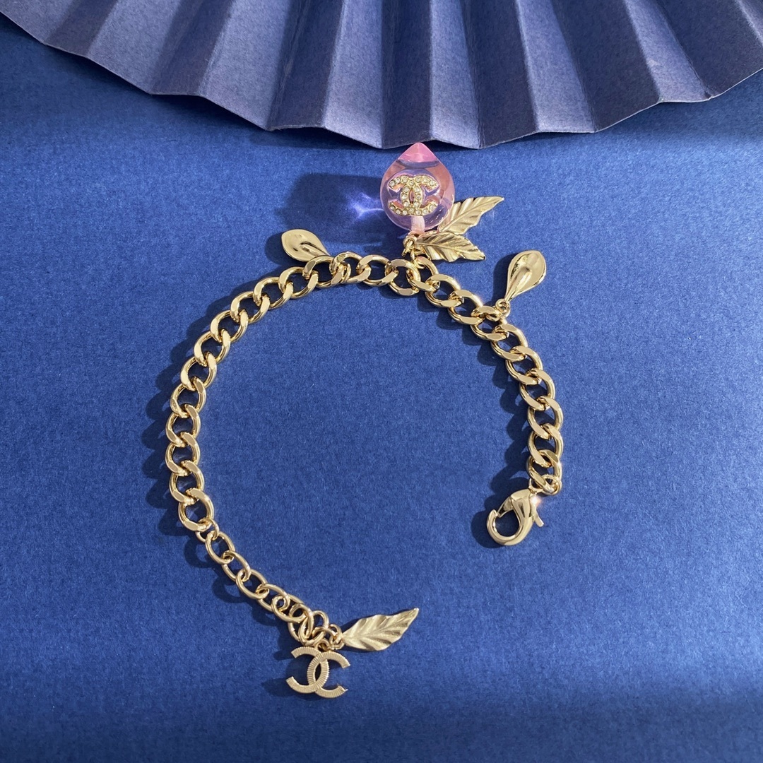 Elegant Gold Pink Peach Crystal Charm Bracelet with Leaf Accents