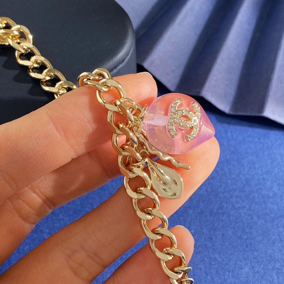 Elegant Gold Pink Peach Crystal Charm Bracelet with Leaf Accents