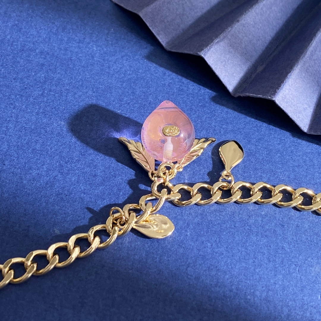 Elegant Gold Pink Peach Crystal Charm Bracelet with Leaf Accents