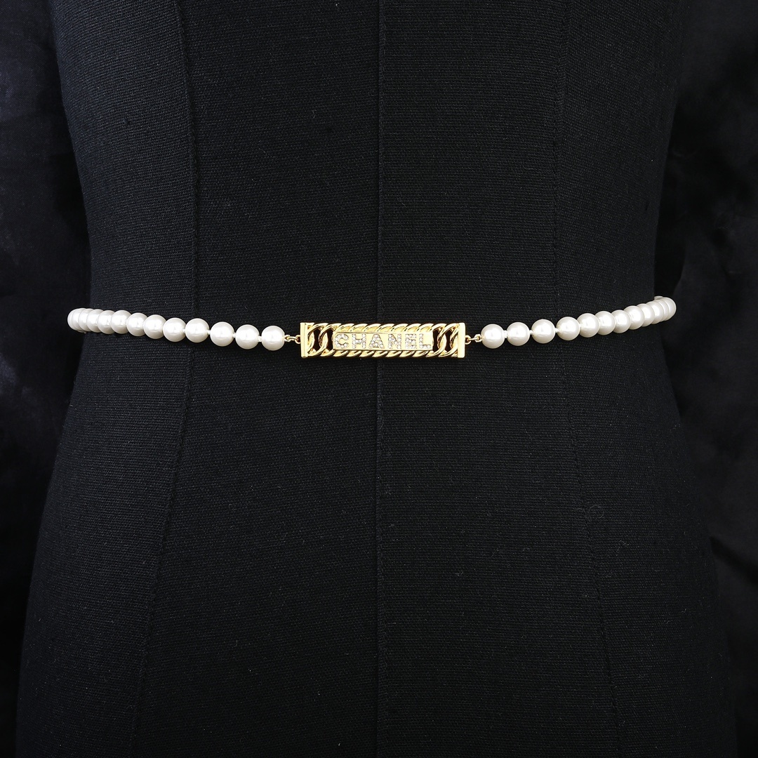 Elegant Chanel Pearl Waist Belt with Gold Crystal Logo Plaque
