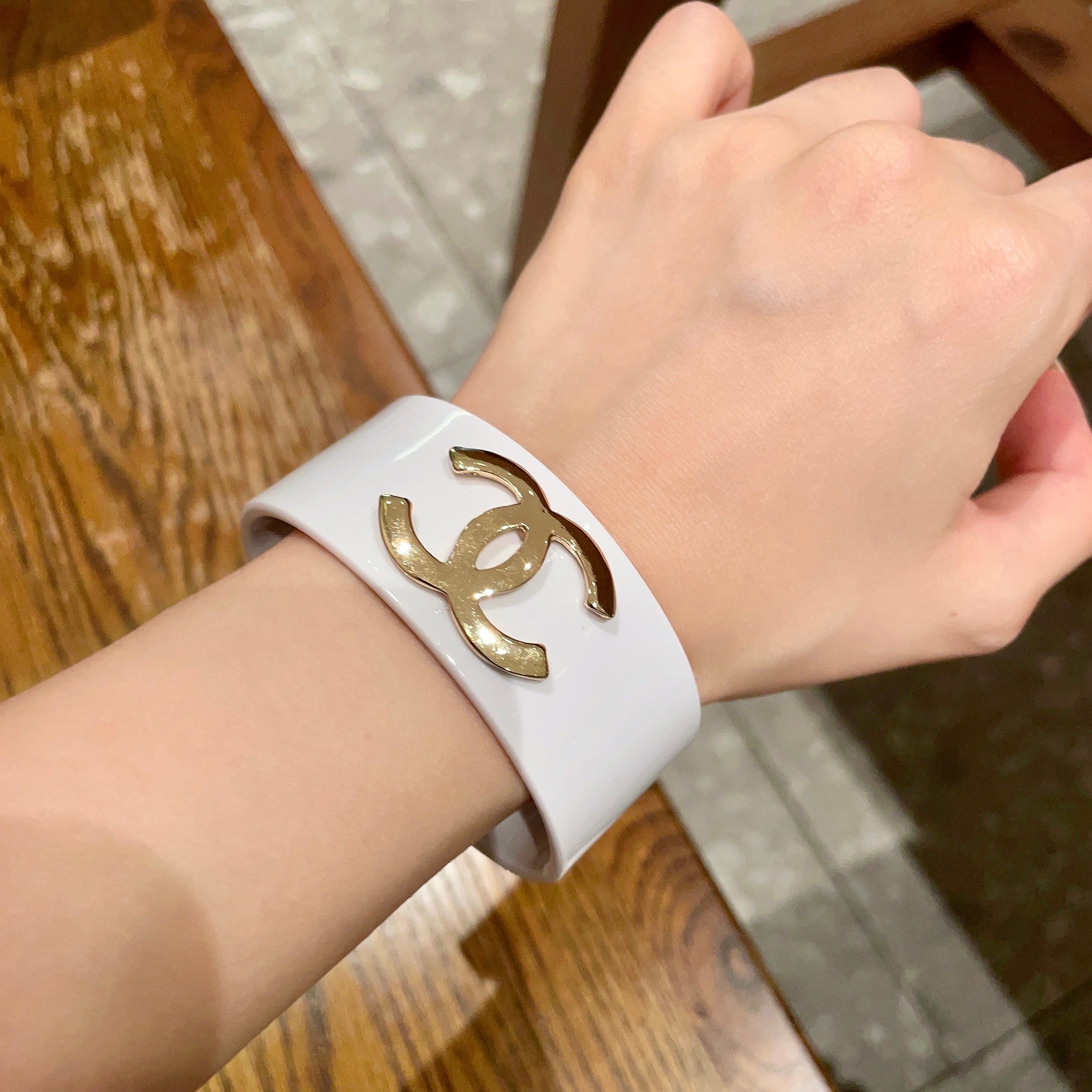 Luxury White Cuff Bracelet with Gold Interlocking Logo Statement