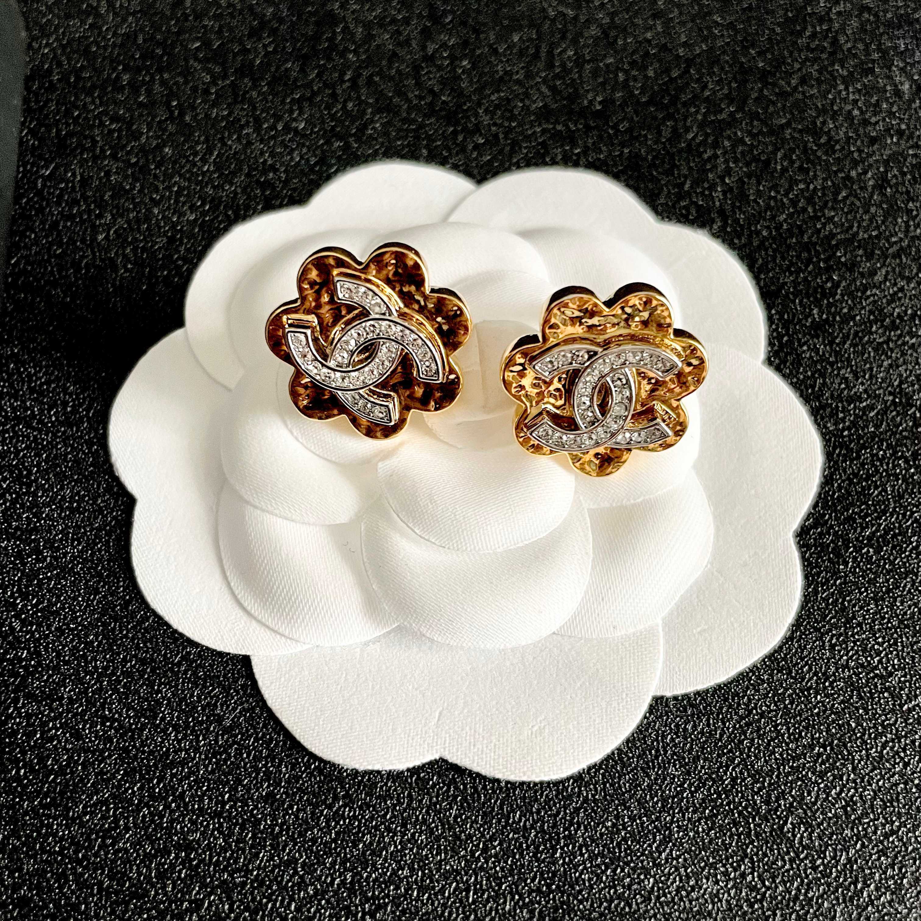 Elegant Gold Flower Stud Earrings with Sparkling Crystal Logo