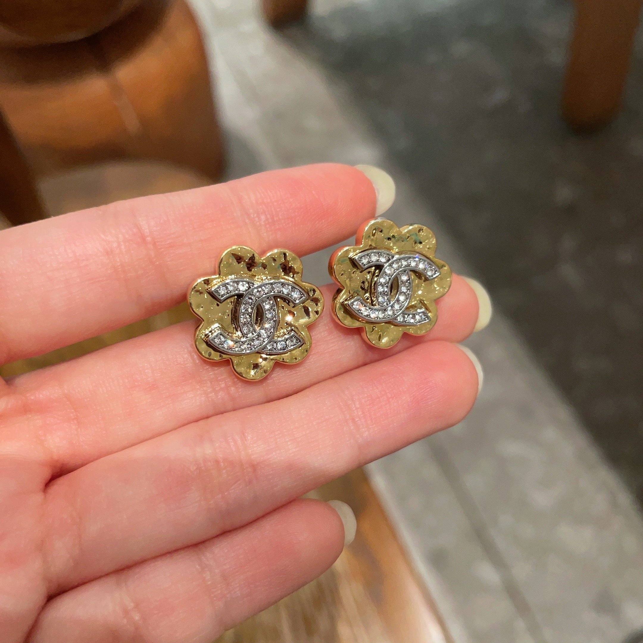 Elegant Gold Flower Stud Earrings with Sparkling Crystal Logo