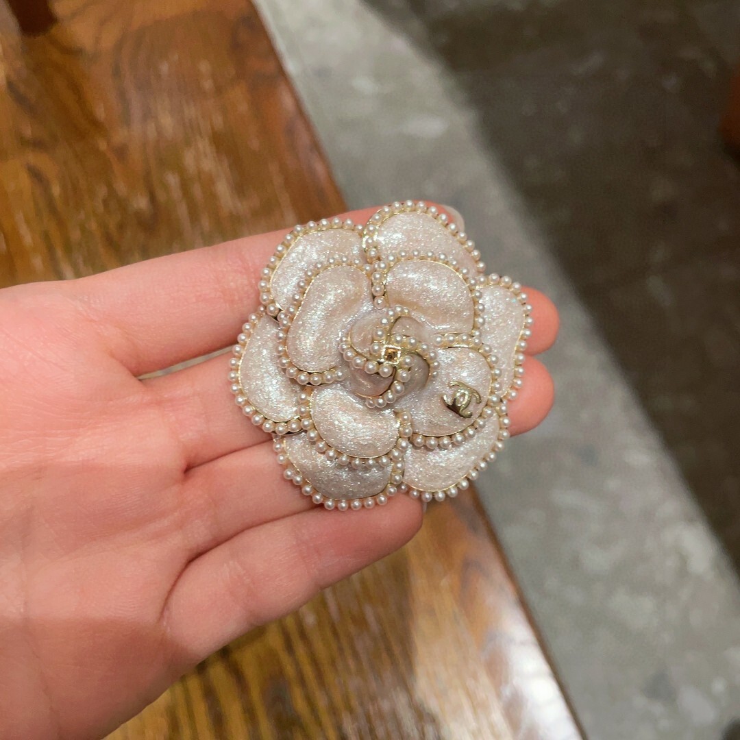 Elegant Chanel Camellia Flower Brooch with Pearl Trim & CC Logo