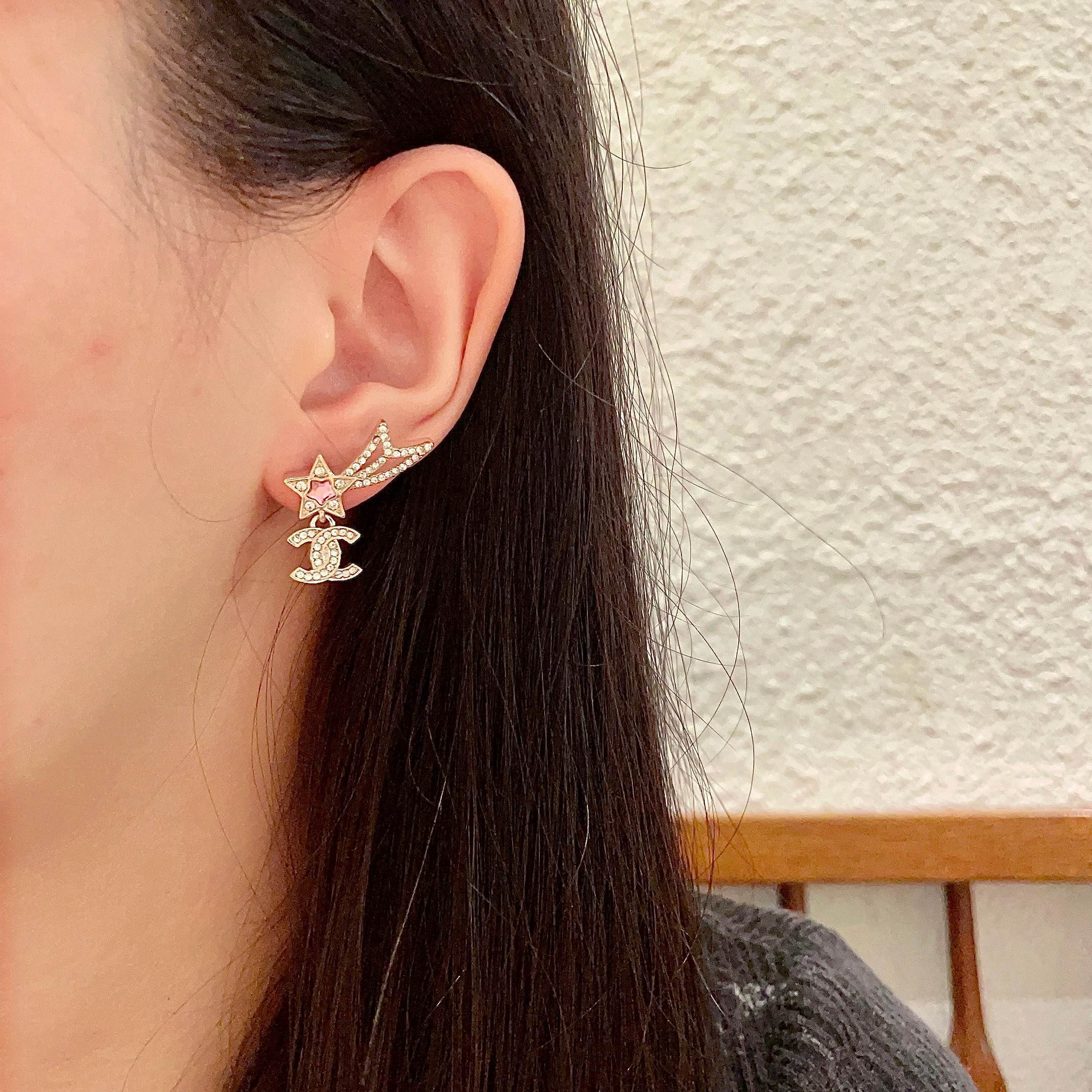 Elegant Gold Shooting Star Studs with Crystal CC Logo & Pink Gem