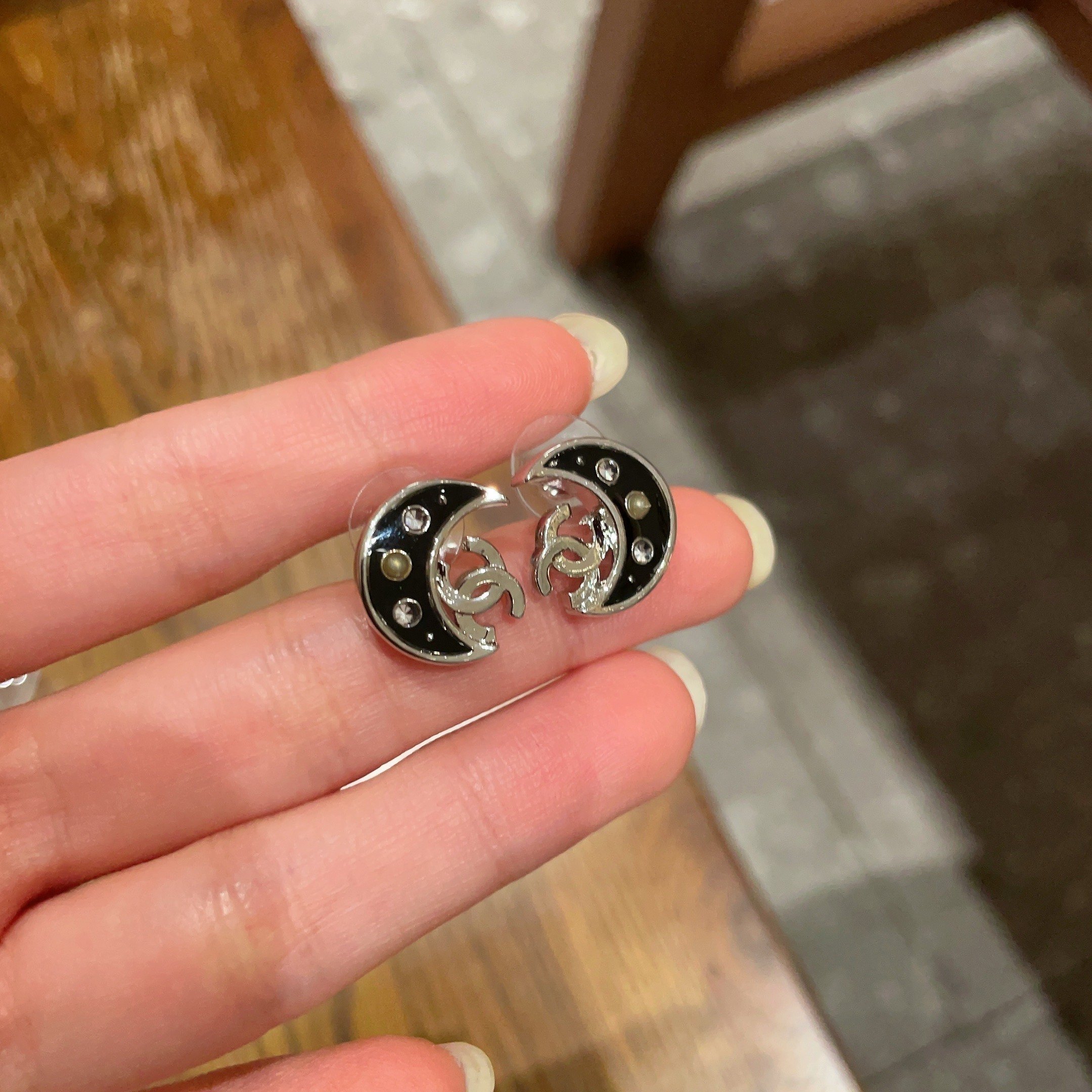 Luxury Black Crescent Moon Stud Earrings with Interlocking Logo