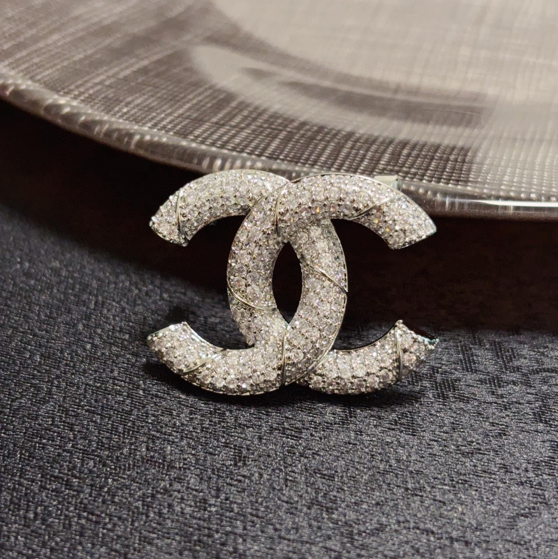 Luxury Chanel Silver-Tone Double C Logo Brooch with Sparkling Crystals