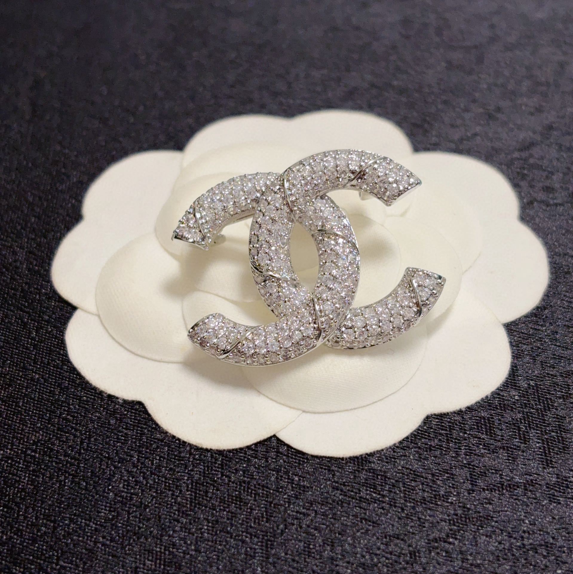 Luxury Chanel Silver-Tone Double C Logo Brooch with Sparkling Crystals