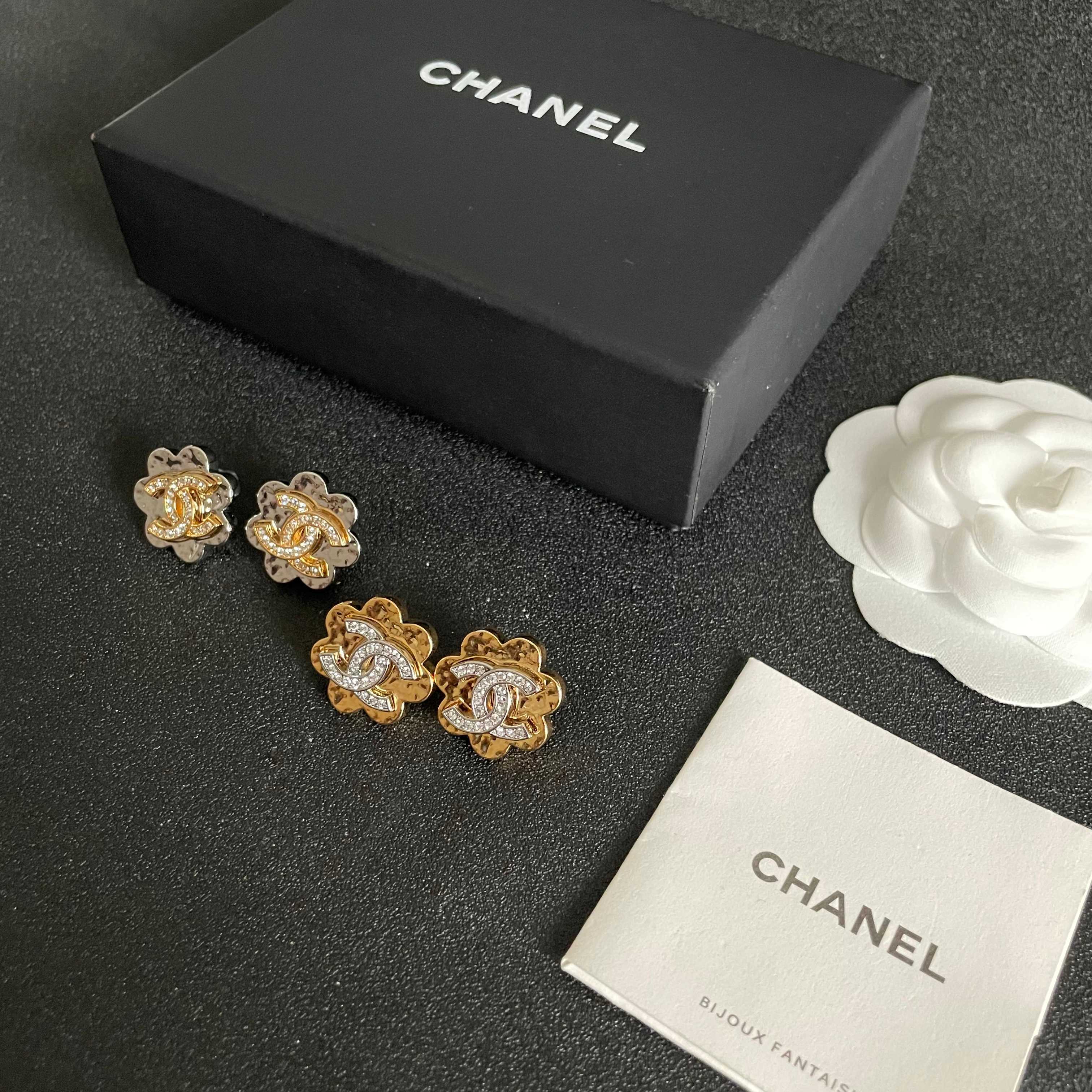 Elegant Gold Flower Stud Earrings with Crystal Logo Detail