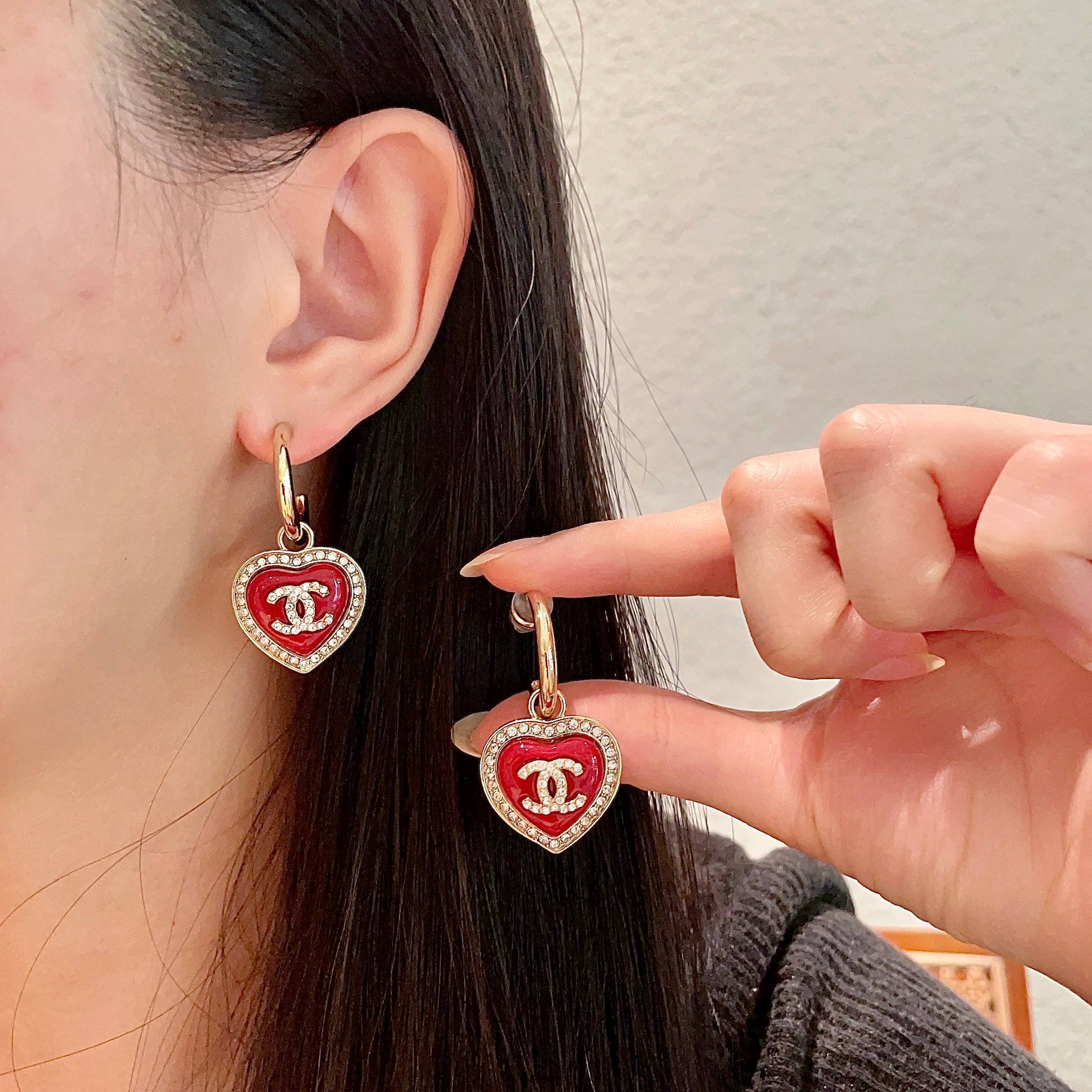 Elegant Red Heart Hoop Earrings with Sparkling Gold Logo
