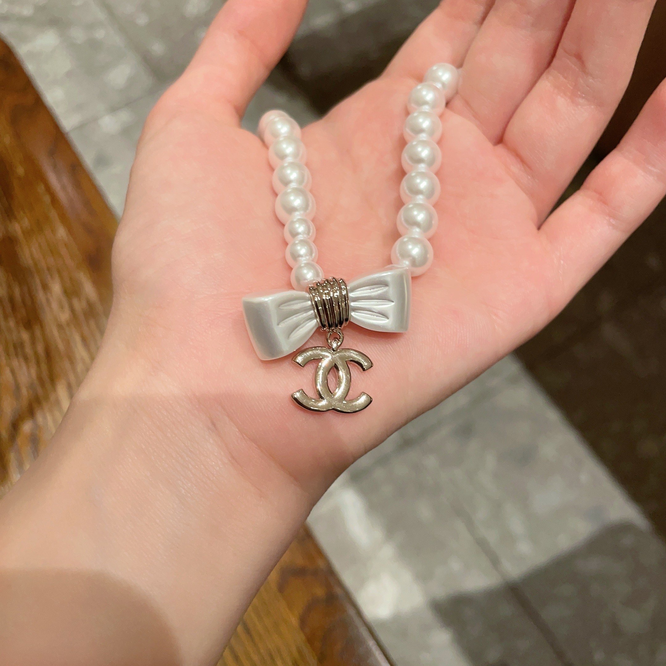 Luxury Pearl Choker Necklace with White Bow and Gold Logo Charm