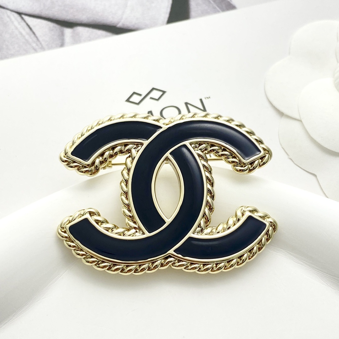 Elegant Black Enamel CC Logo Brooch with Gold-Tone Braided Edge
