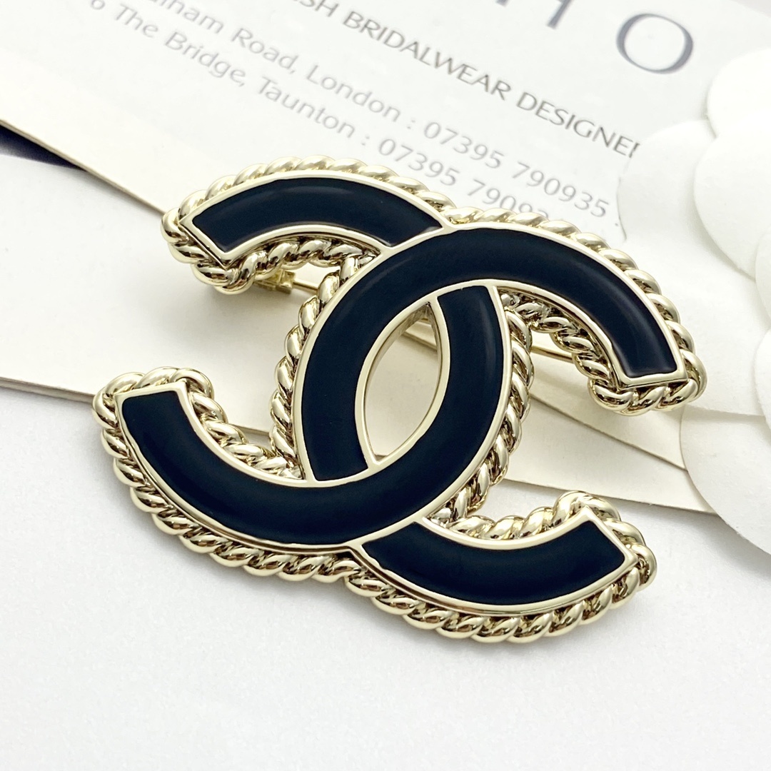 Elegant Black Enamel CC Logo Brooch with Gold-Tone Braided Edge