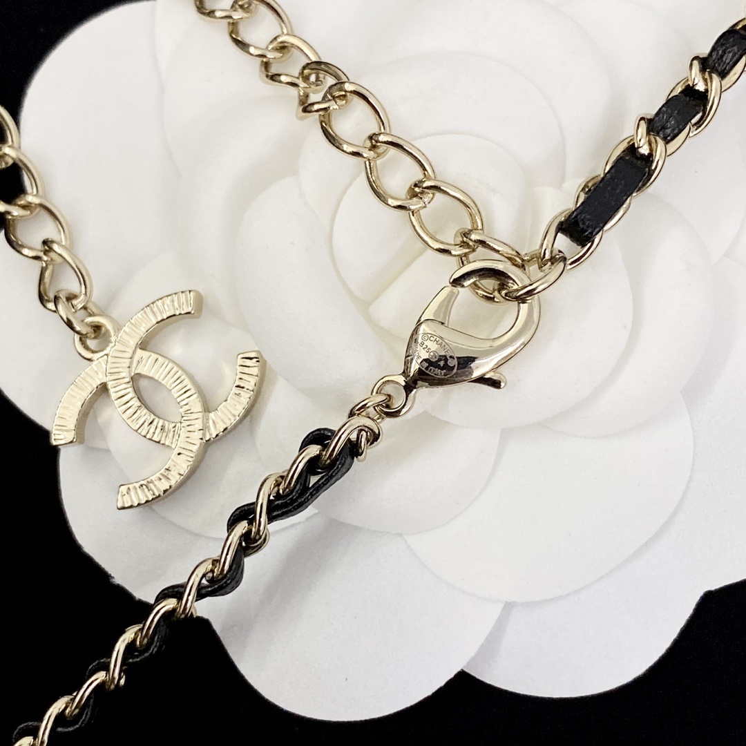 Elegant Crystal Bow Long Necklace with Interwoven Leather Chain