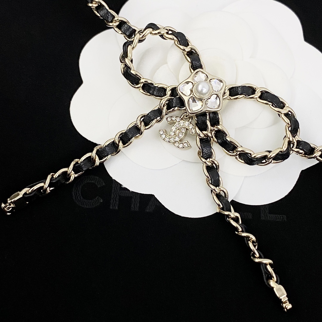 Elegant Crystal Bow Long Necklace with Interwoven Leather Chain