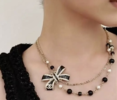 Luxury Double Strand Pearl Necklace with Black Crystal Bow Pendant