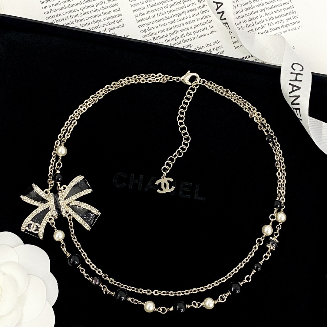 Luxury Double Strand Pearl Necklace with Black Crystal Bow Pendant