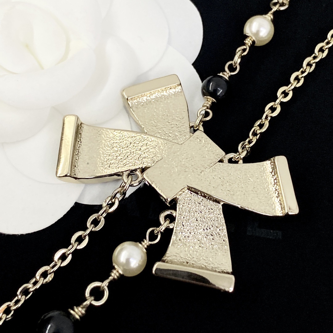 Luxury Double Strand Pearl Necklace with Black Crystal Bow Pendant