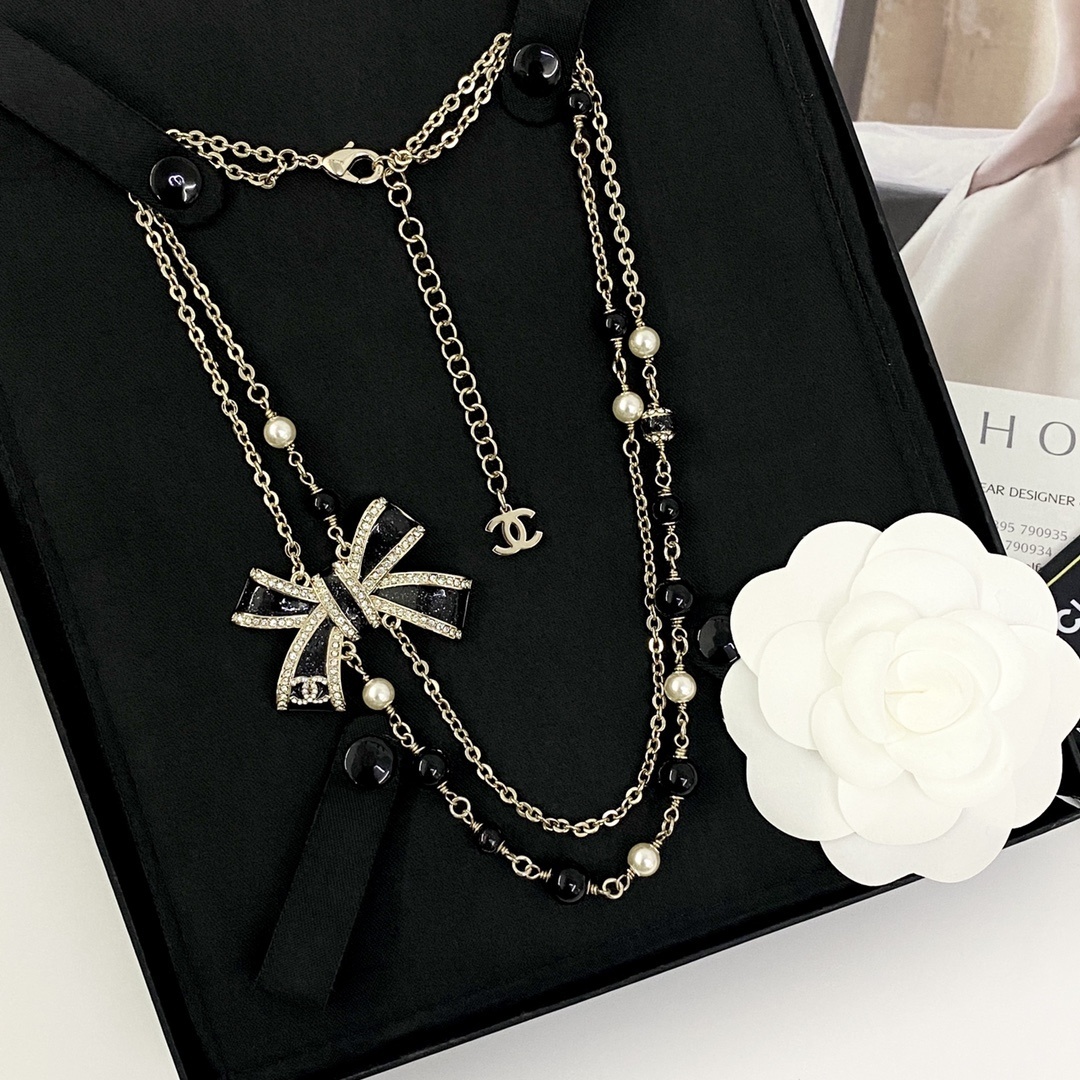 Luxury Double Strand Pearl Necklace with Black Crystal Bow Pendant