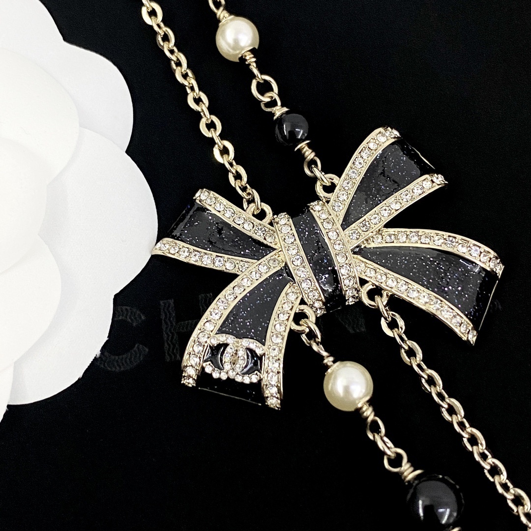Luxury Double Strand Pearl Necklace with Black Crystal Bow Pendant