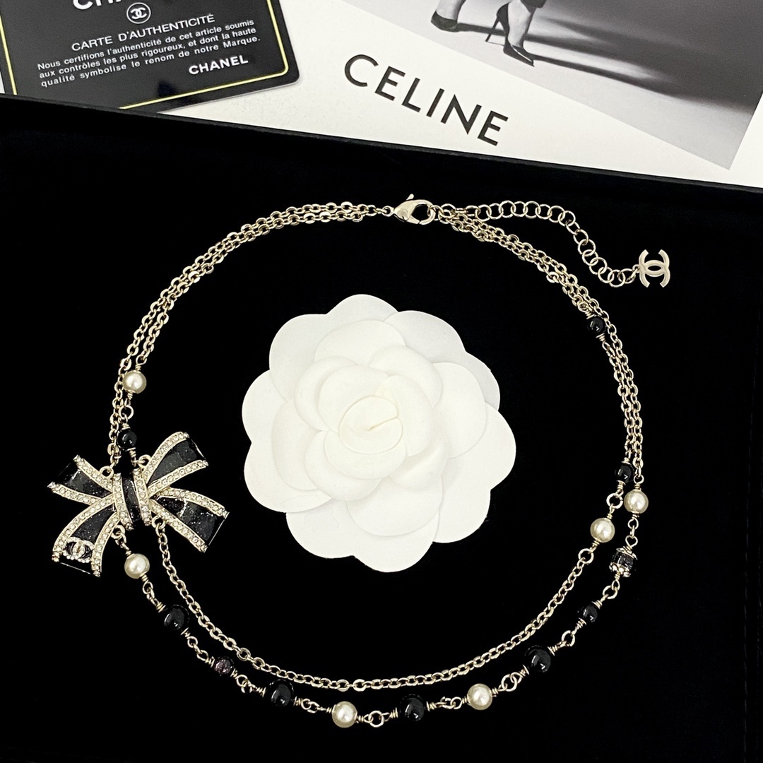 Luxury Double Strand Pearl Necklace with Black Crystal Bow Pendant