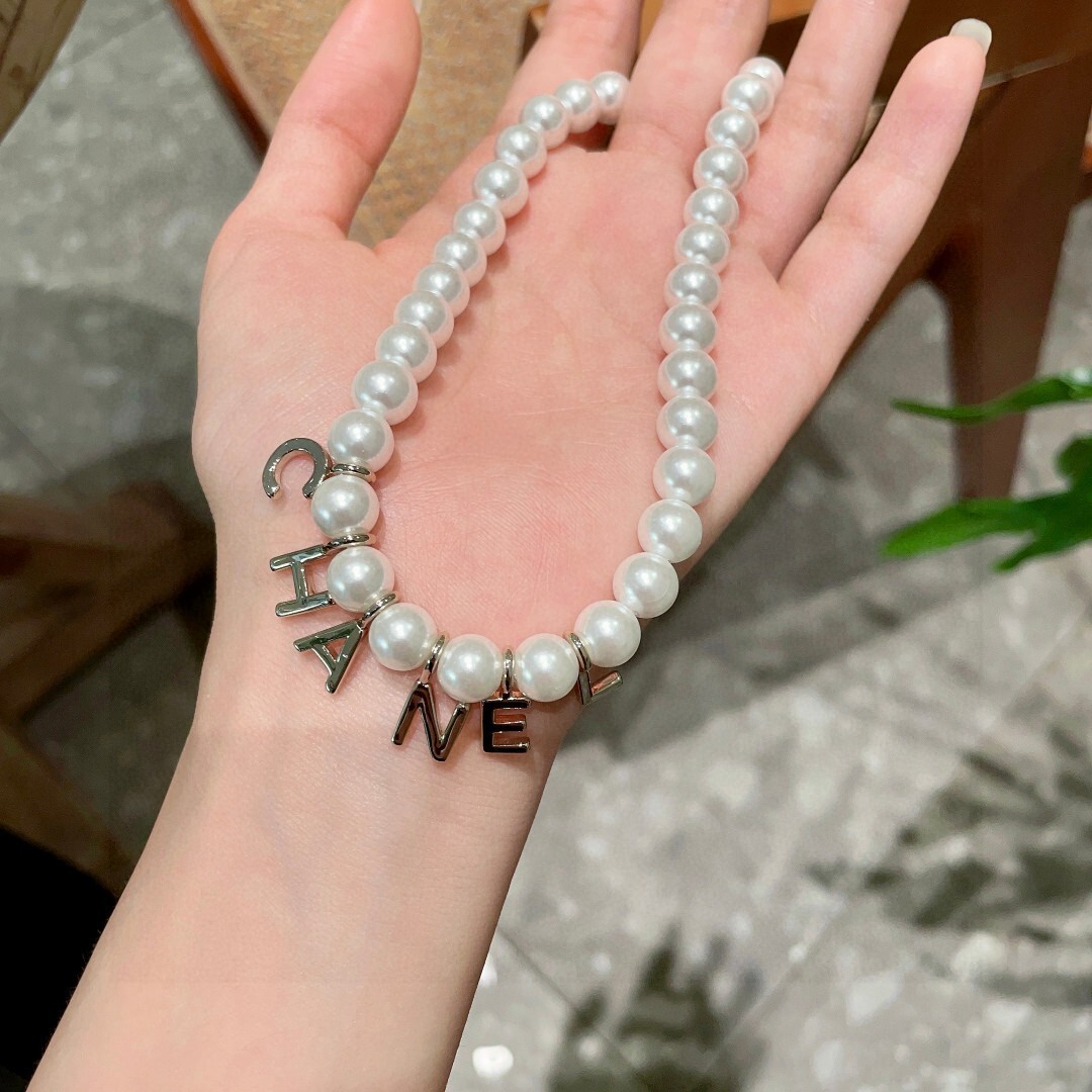 Elegant Pearl Necklace with CHANEL Letter Charms for Women