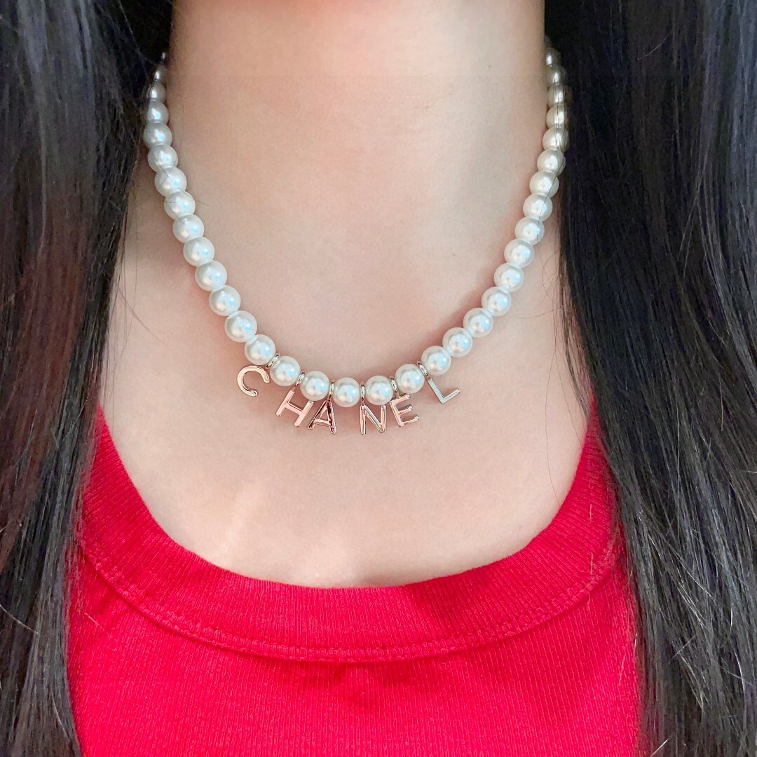 Elegant Pearl Necklace with CHANEL Letter Charms for Women