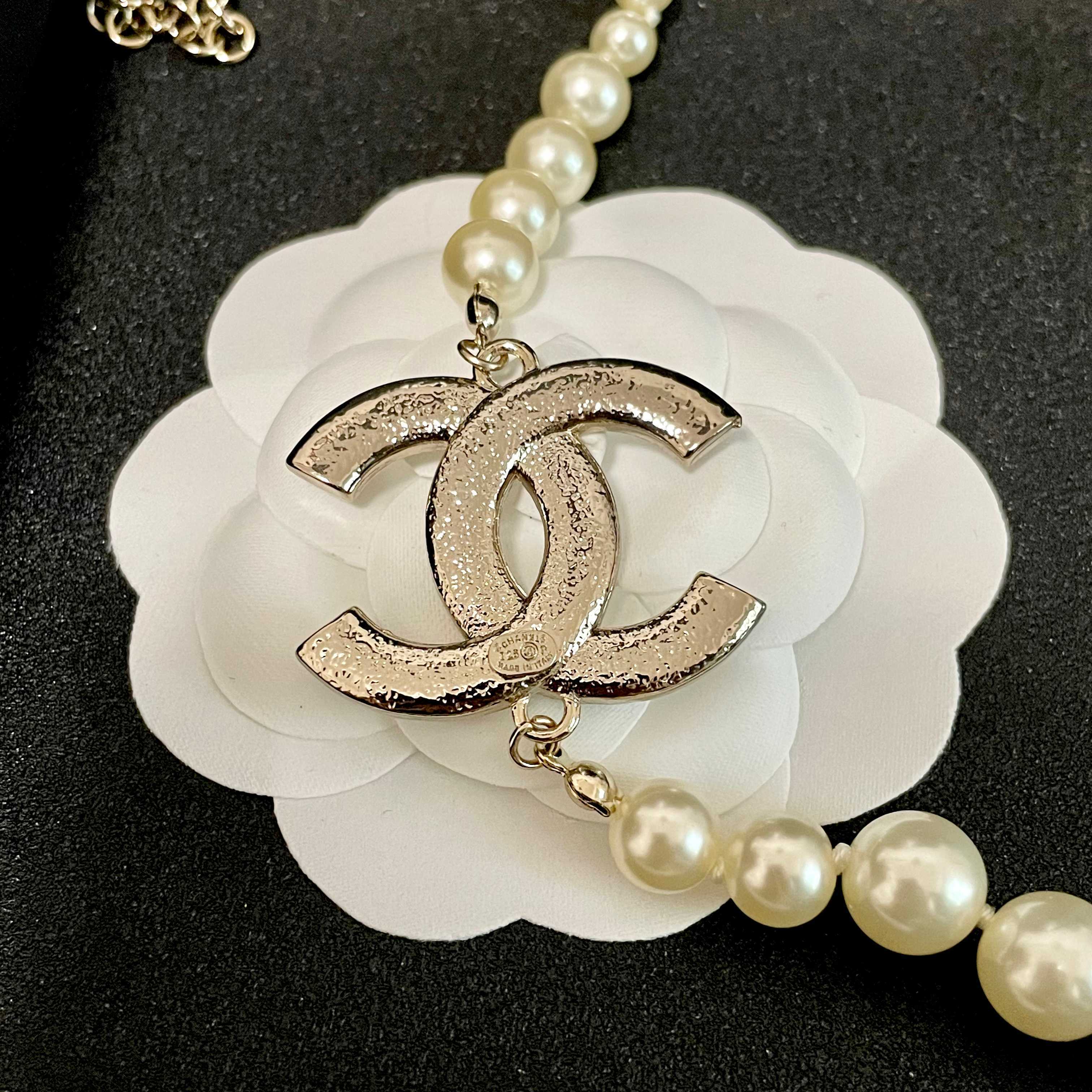 Elegant Pearl Necklace with Sparkling Crystal CC Logo Pendant