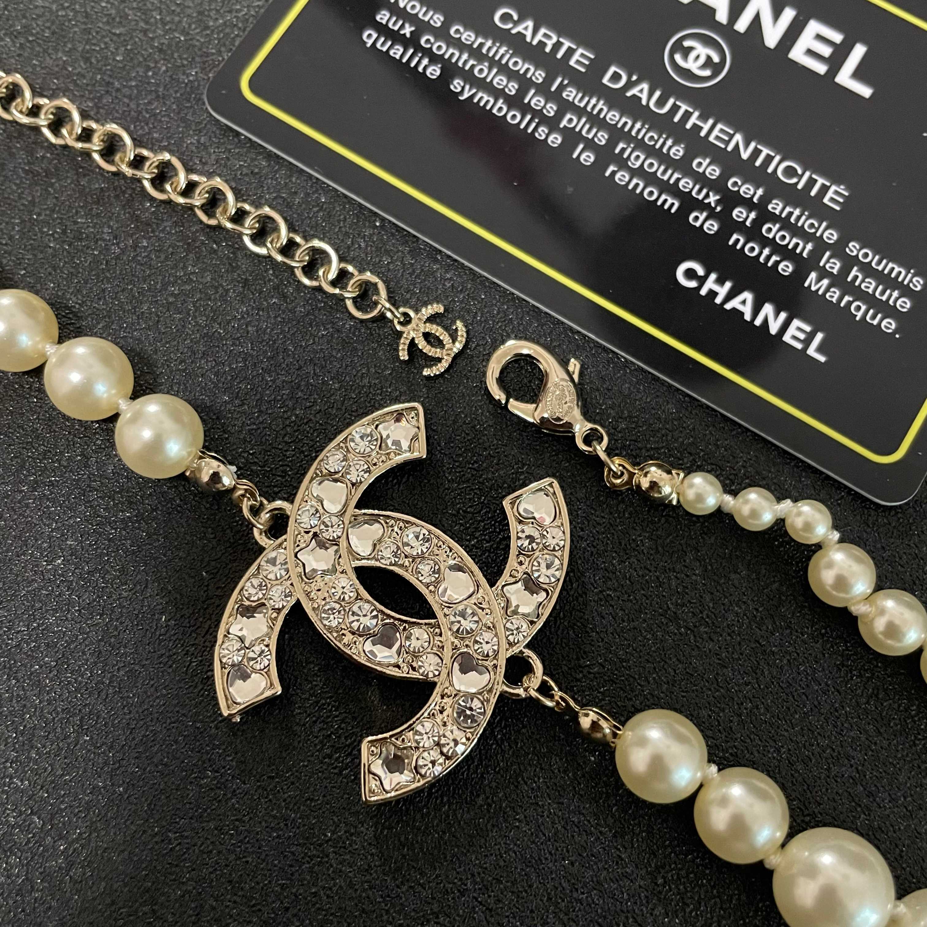 Elegant Pearl Necklace with Sparkling Crystal CC Logo Pendant