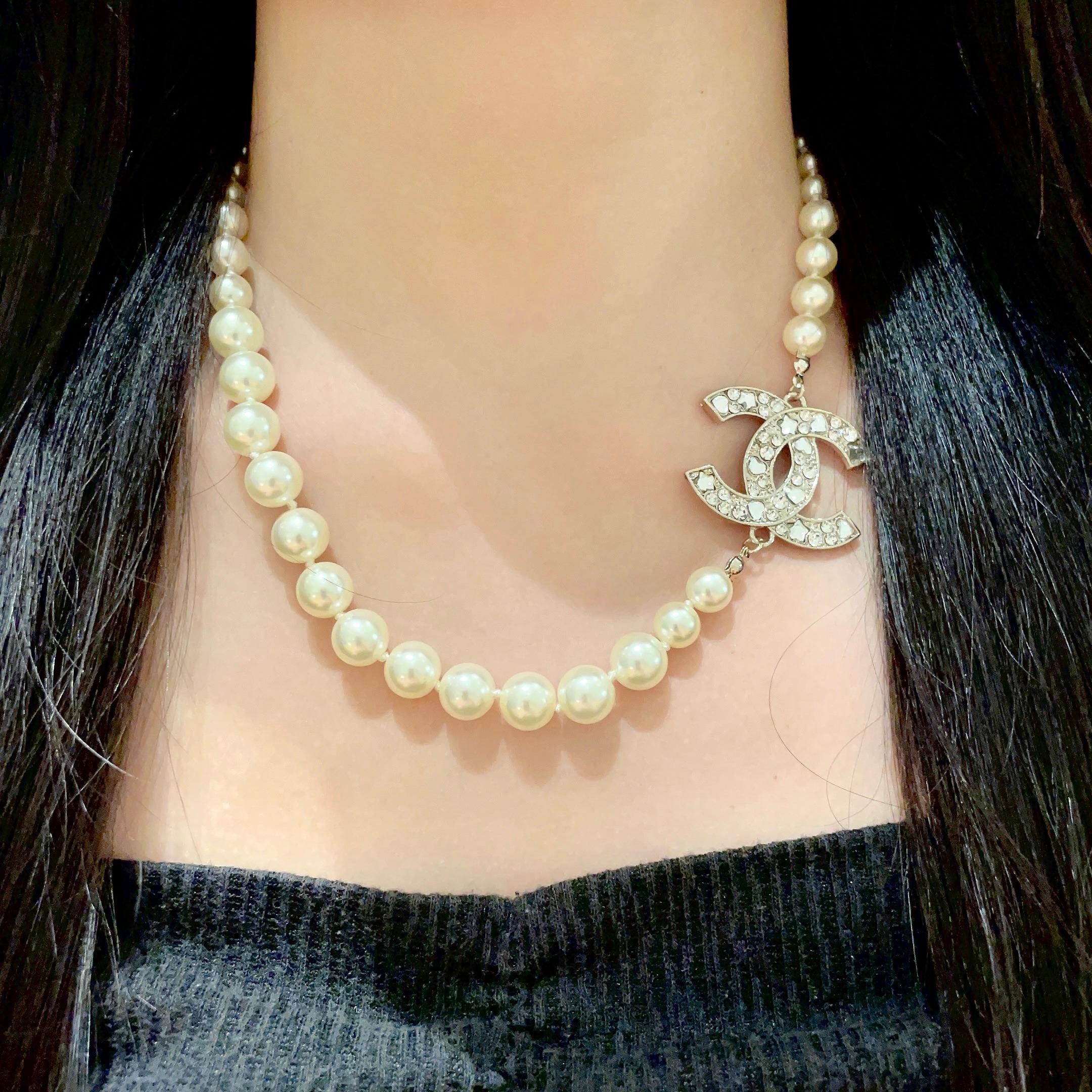 Elegant Pearl Necklace with Sparkling Crystal CC Logo Pendant