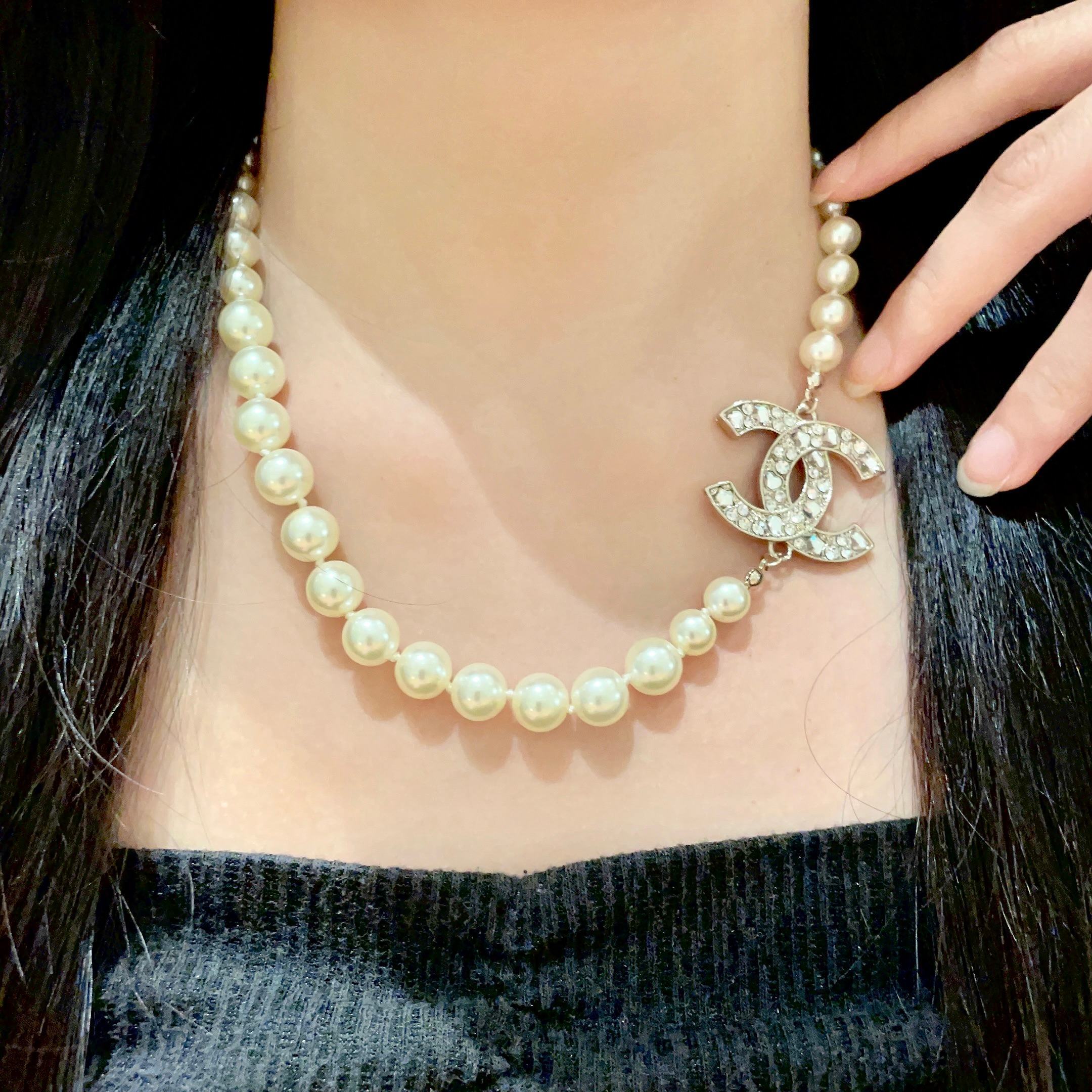 Elegant Pearl Necklace with Sparkling Crystal CC Logo Pendant