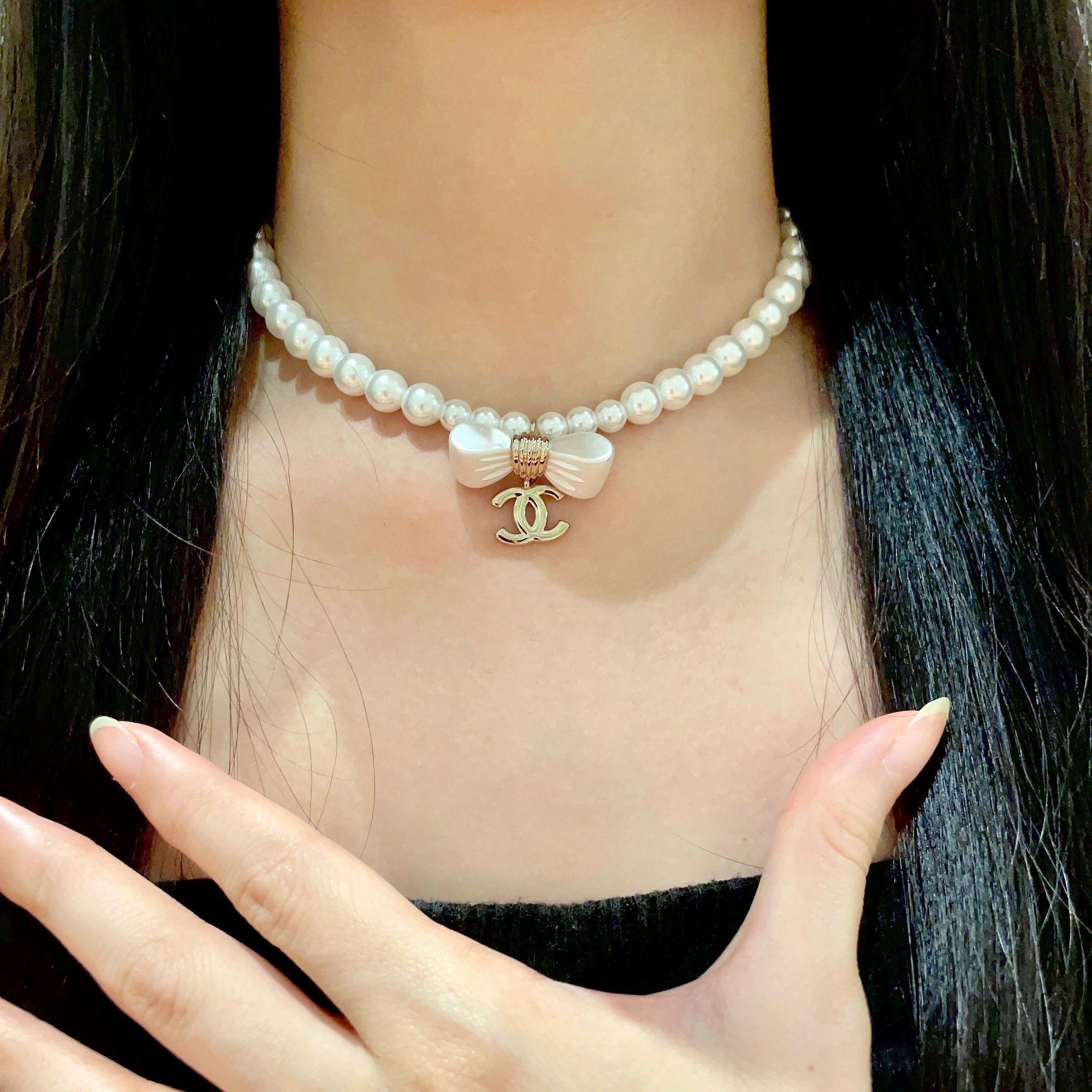 Elegant Pearl Choker Necklace with White Bow and Gold CC Pendant