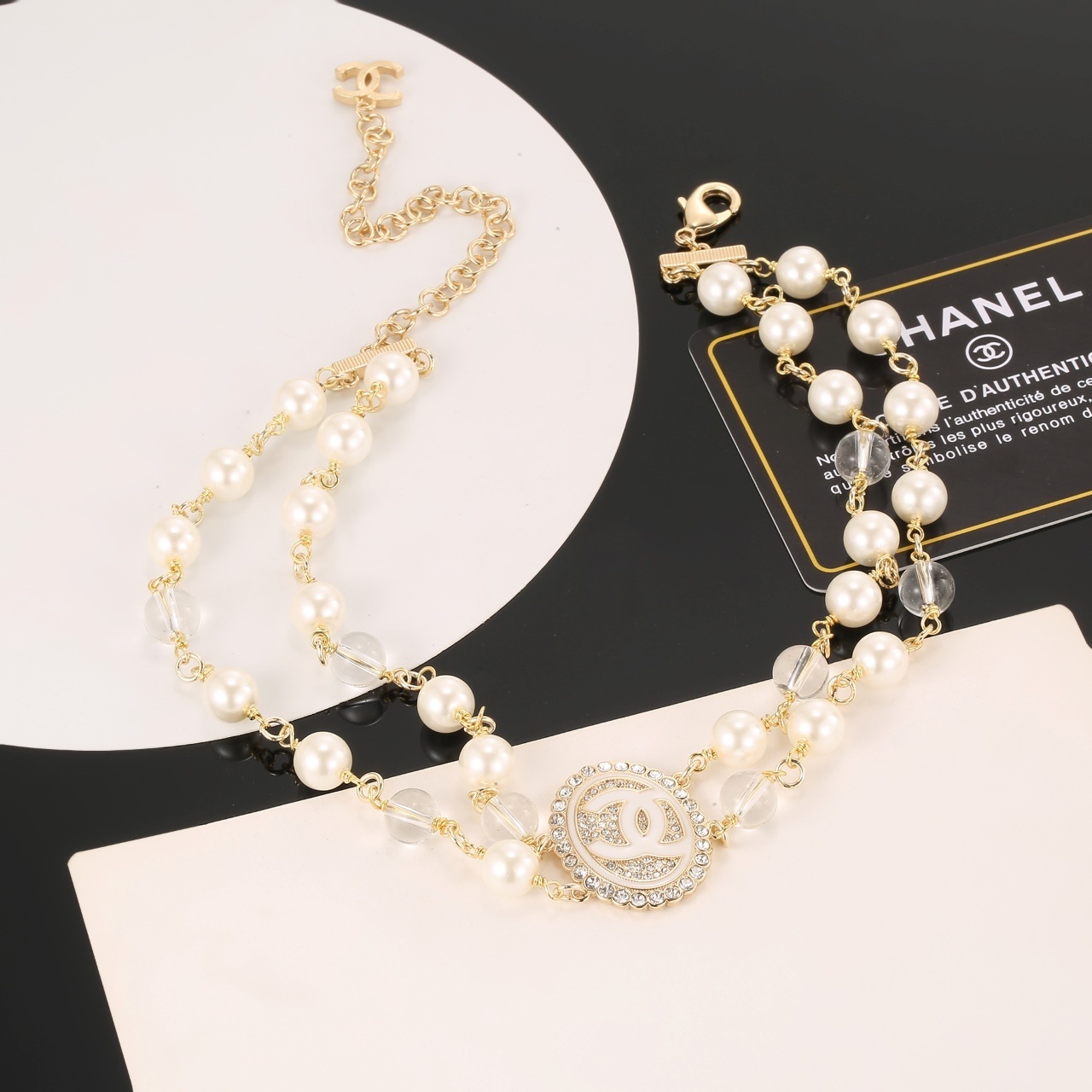 Elegant Double Strand Pearl Necklace with Crystal CC Medallion