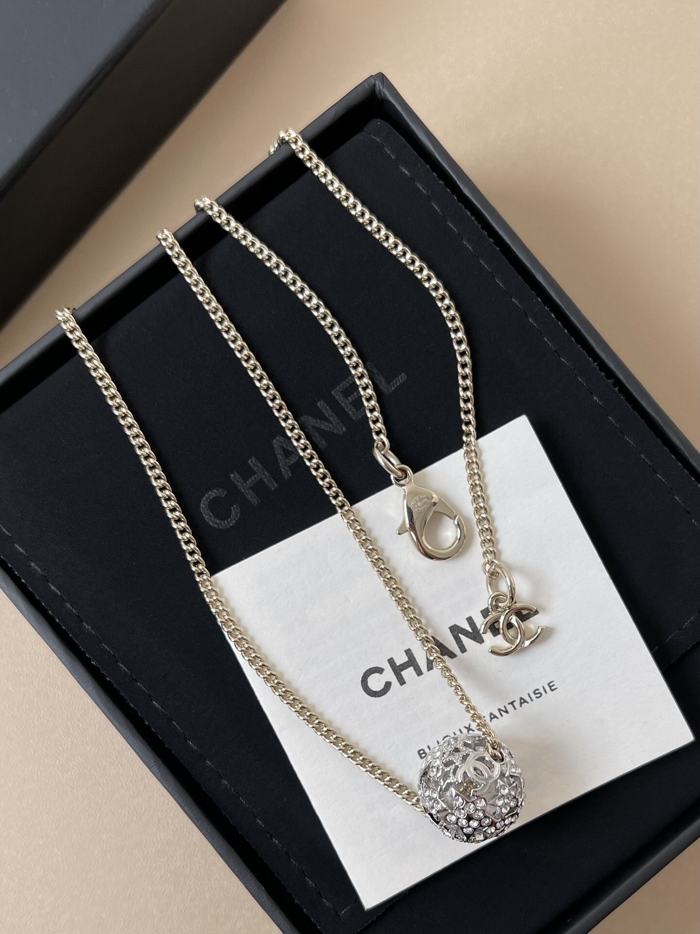 Chanel CC Logo Crystal Sphere Necklace - Elegant Gold Tone Jewelry