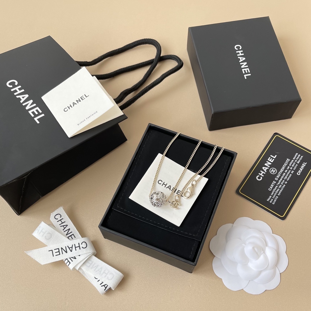 Chanel CC Logo Crystal Sphere Necklace - Elegant Gold Tone Jewelry