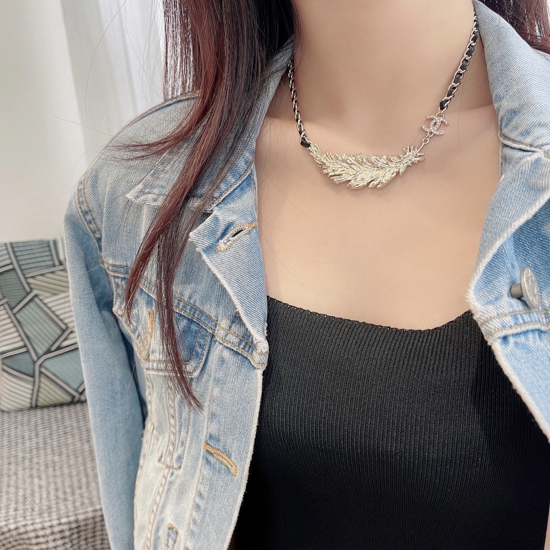 Luxury Gold Feather CC Logo Necklace with Interwoven Leather