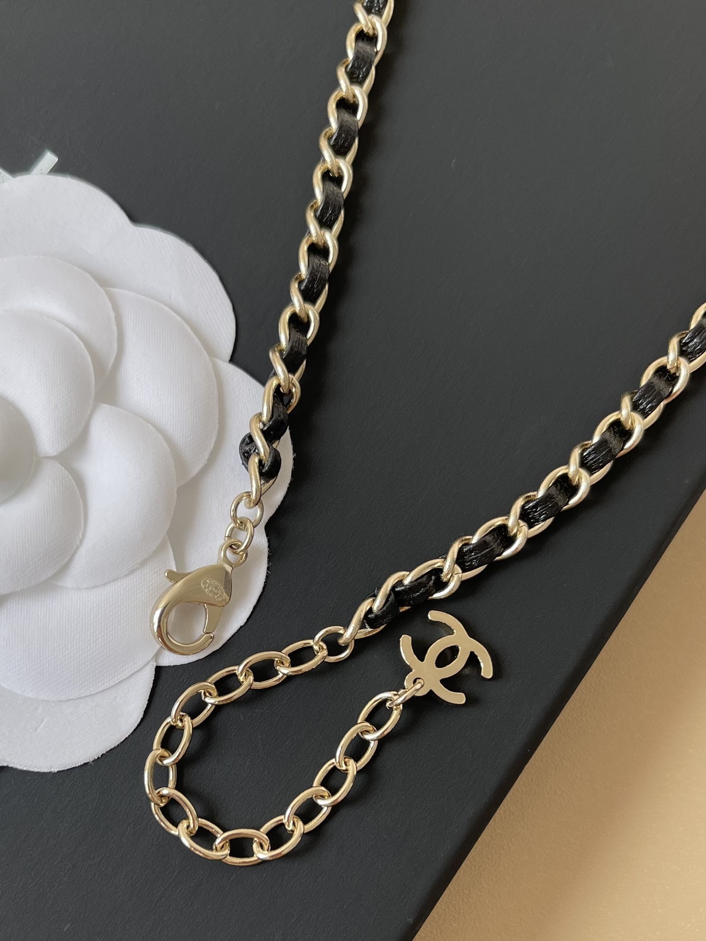 Luxury Gold Feather CC Logo Necklace with Interwoven Leather