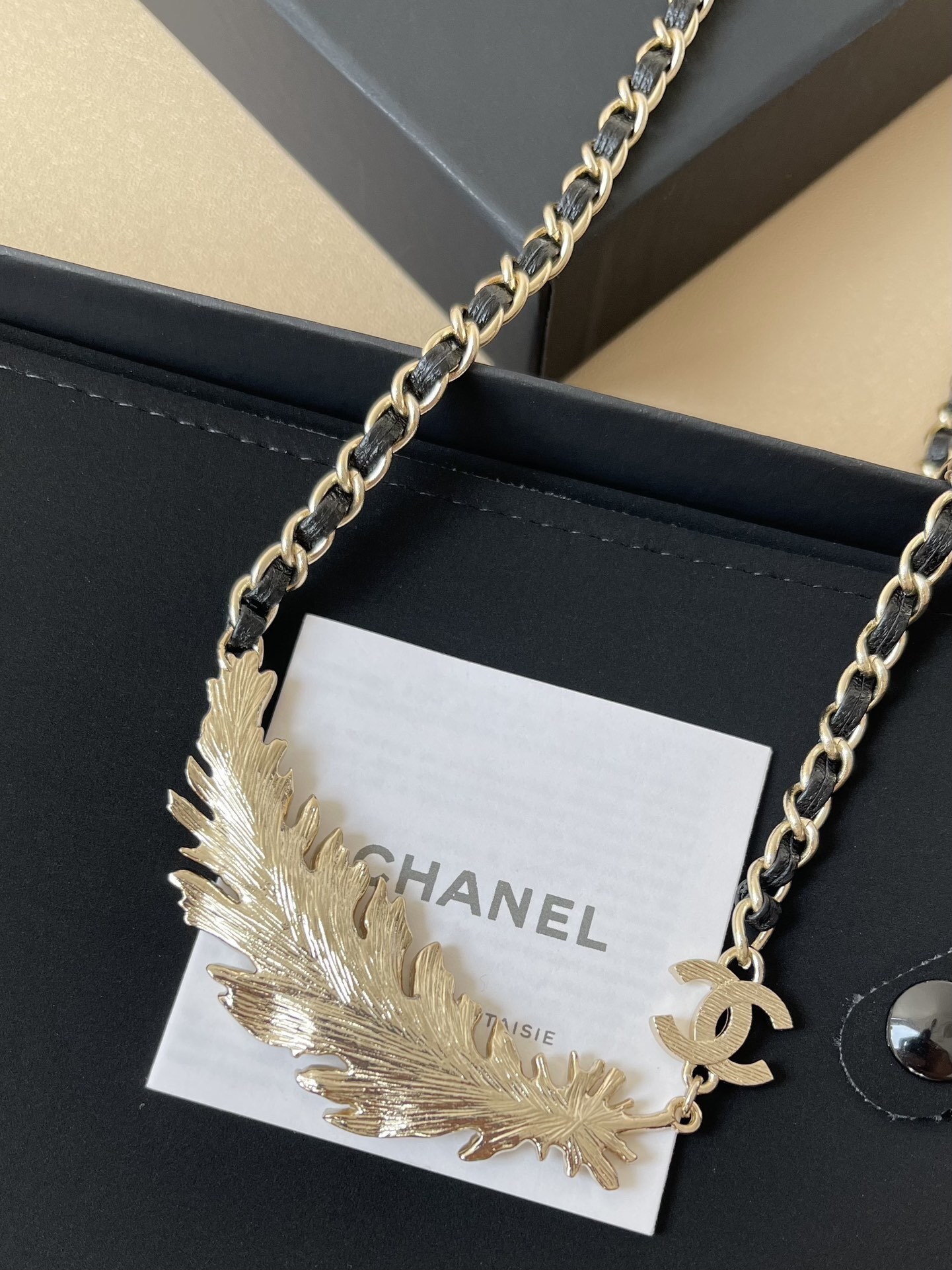 Luxury Gold Feather CC Logo Necklace with Interwoven Leather