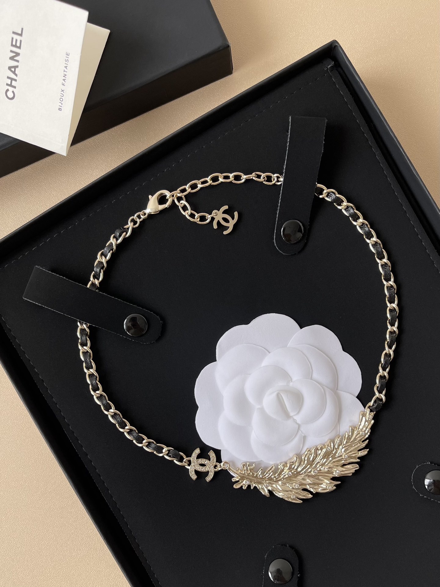 Luxury Gold Feather CC Logo Necklace with Interwoven Leather