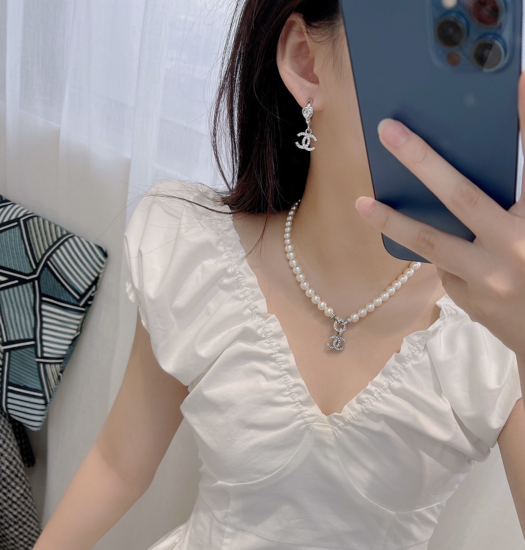 Elegant Pearl Necklace with Sparkling Crystal Double C Pendant