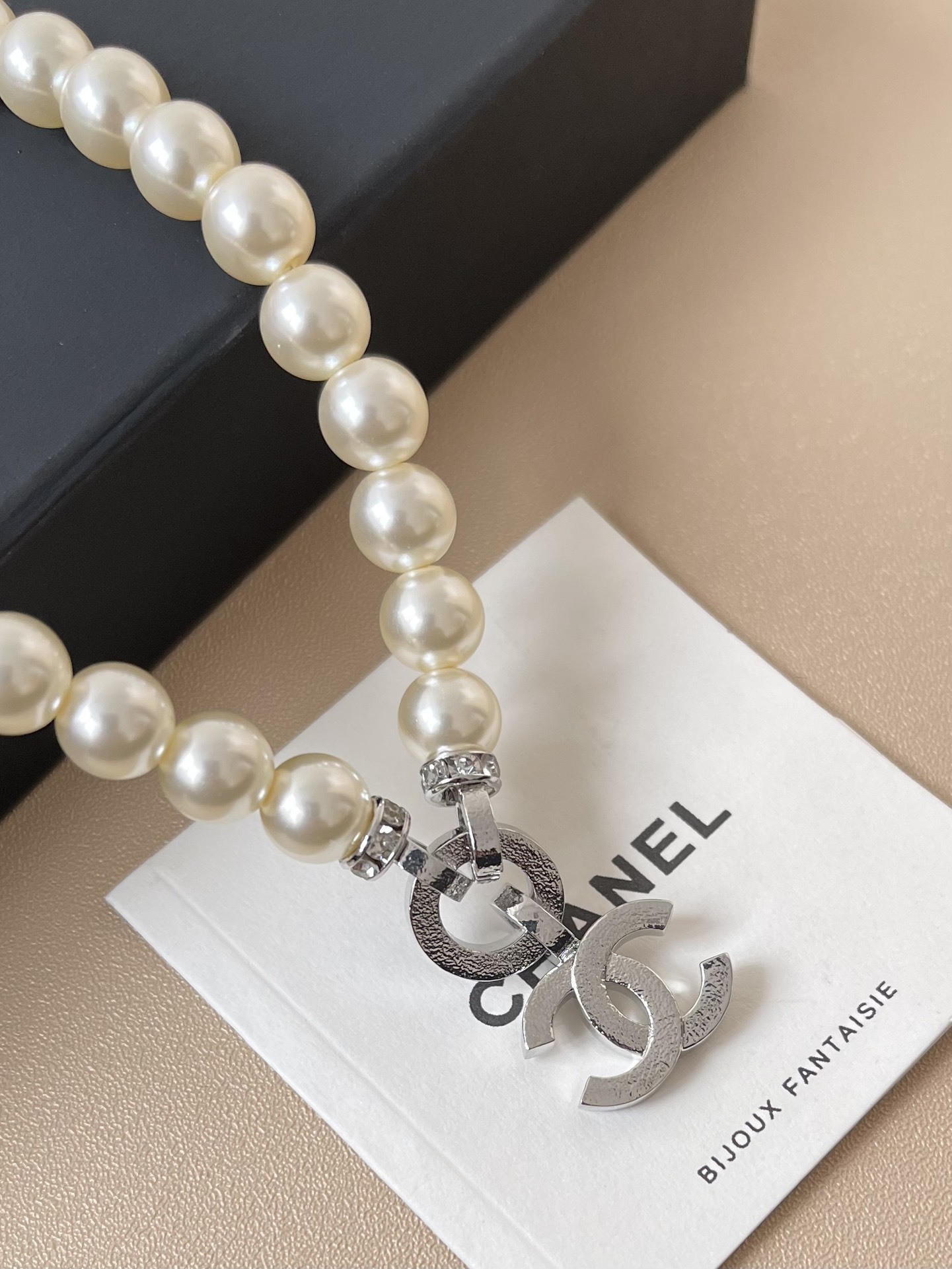 Elegant Pearl Necklace with Sparkling Crystal Double C Pendant