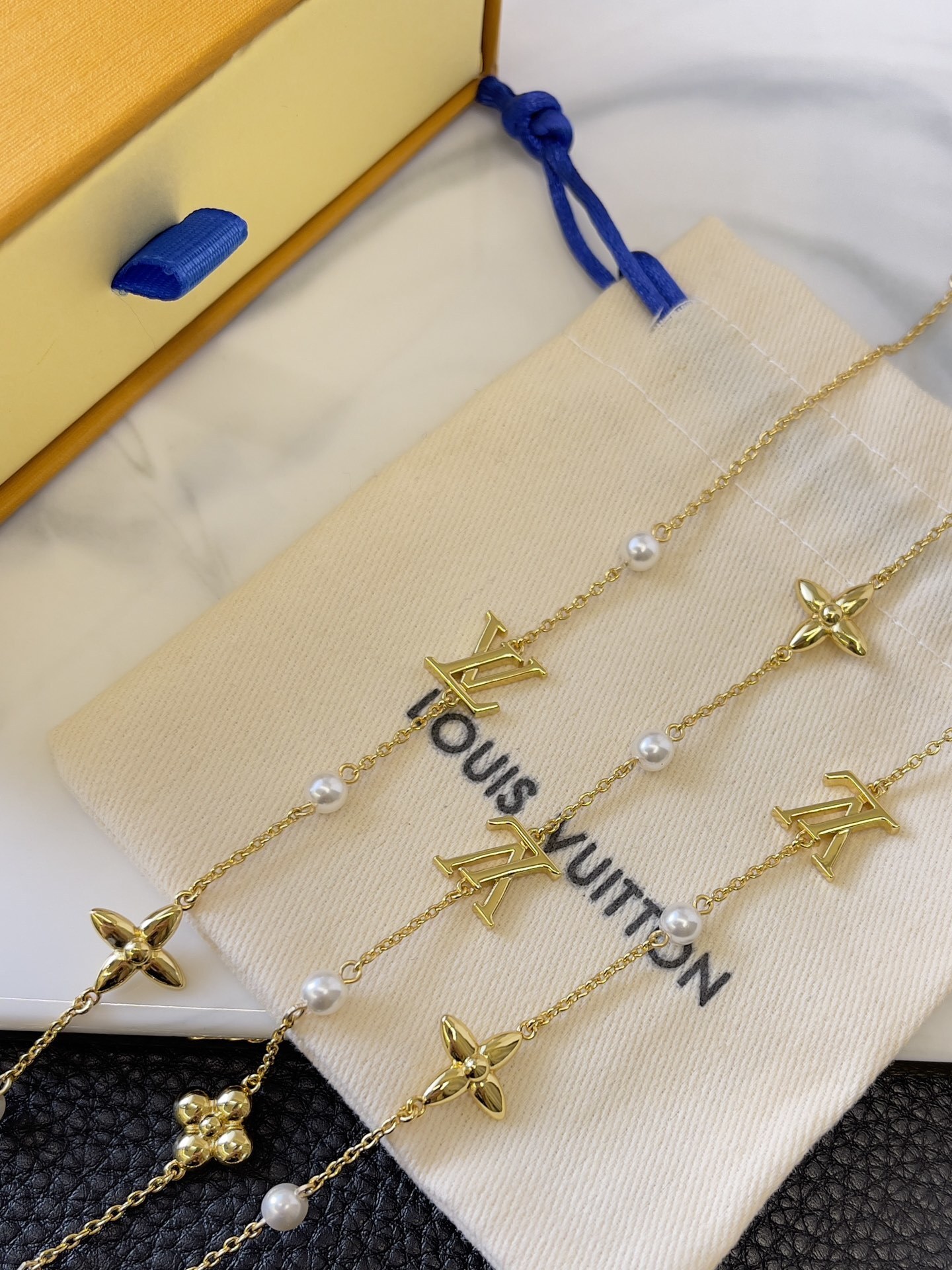 Elegant Gold-Tone Pearl Long Necklace with Floral & Logo Charms