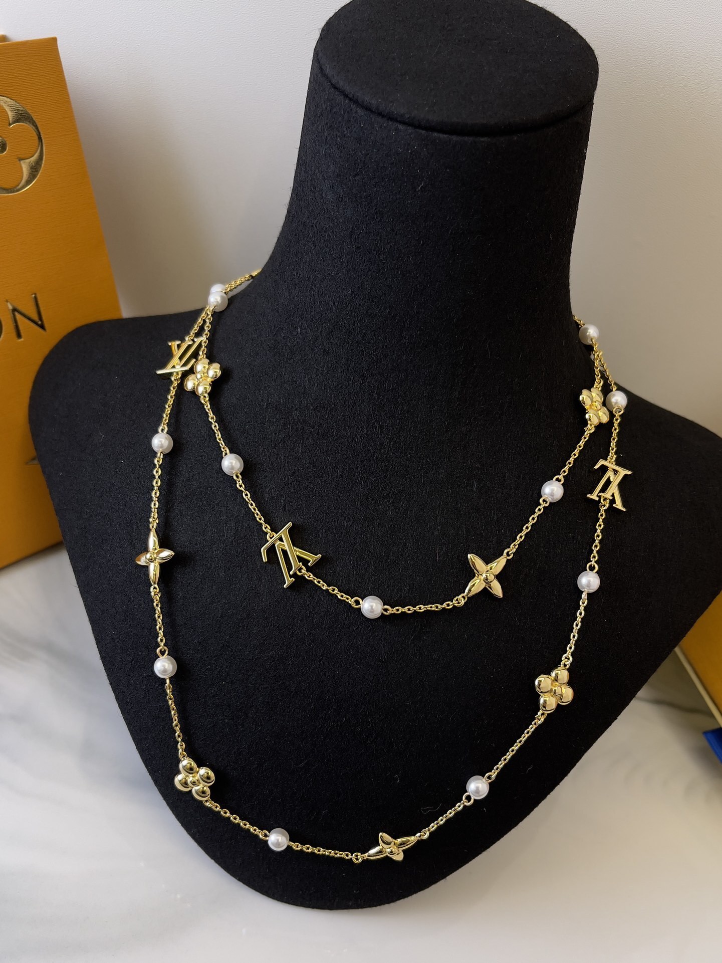 Elegant Gold-Tone Pearl Long Necklace with Floral & Logo Charms