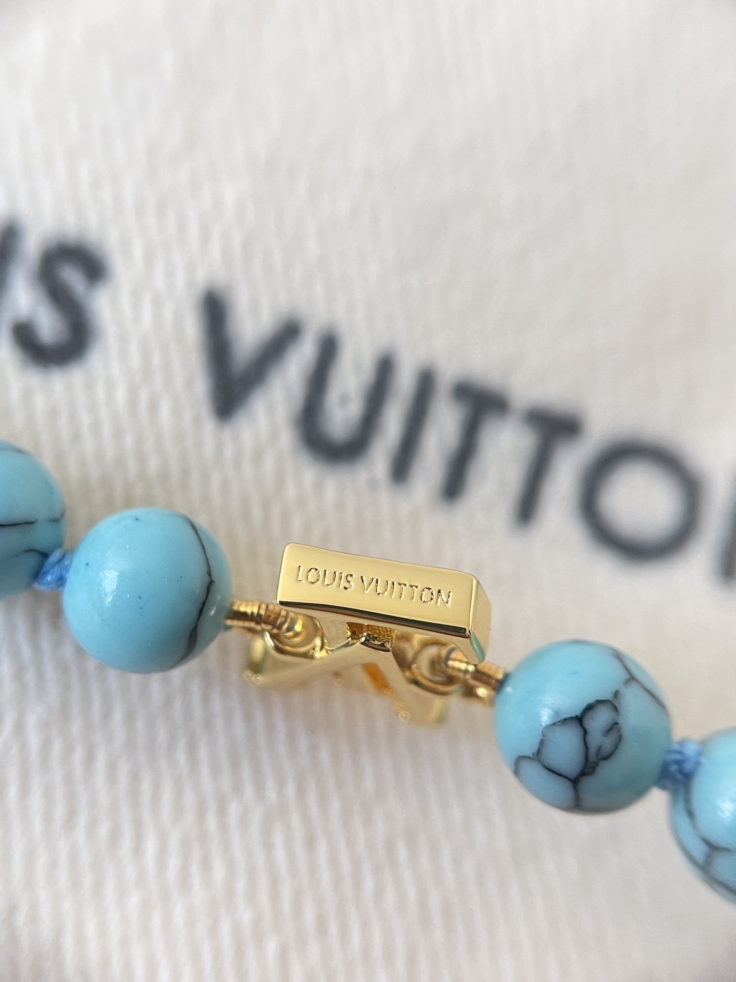 Louis Vuitton Turquoise Beaded Necklace with Gold Monogram Charms
