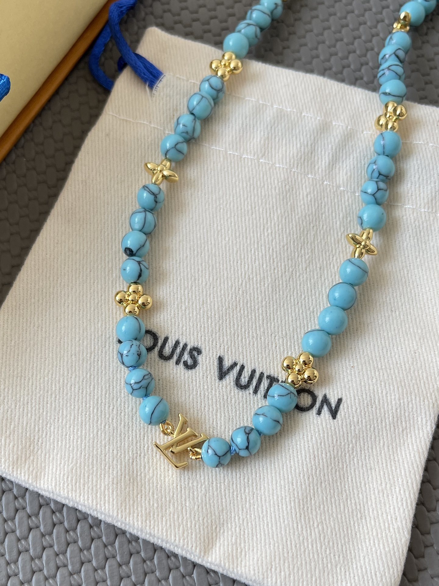Louis Vuitton Turquoise Beaded Necklace with Gold Monogram Charms