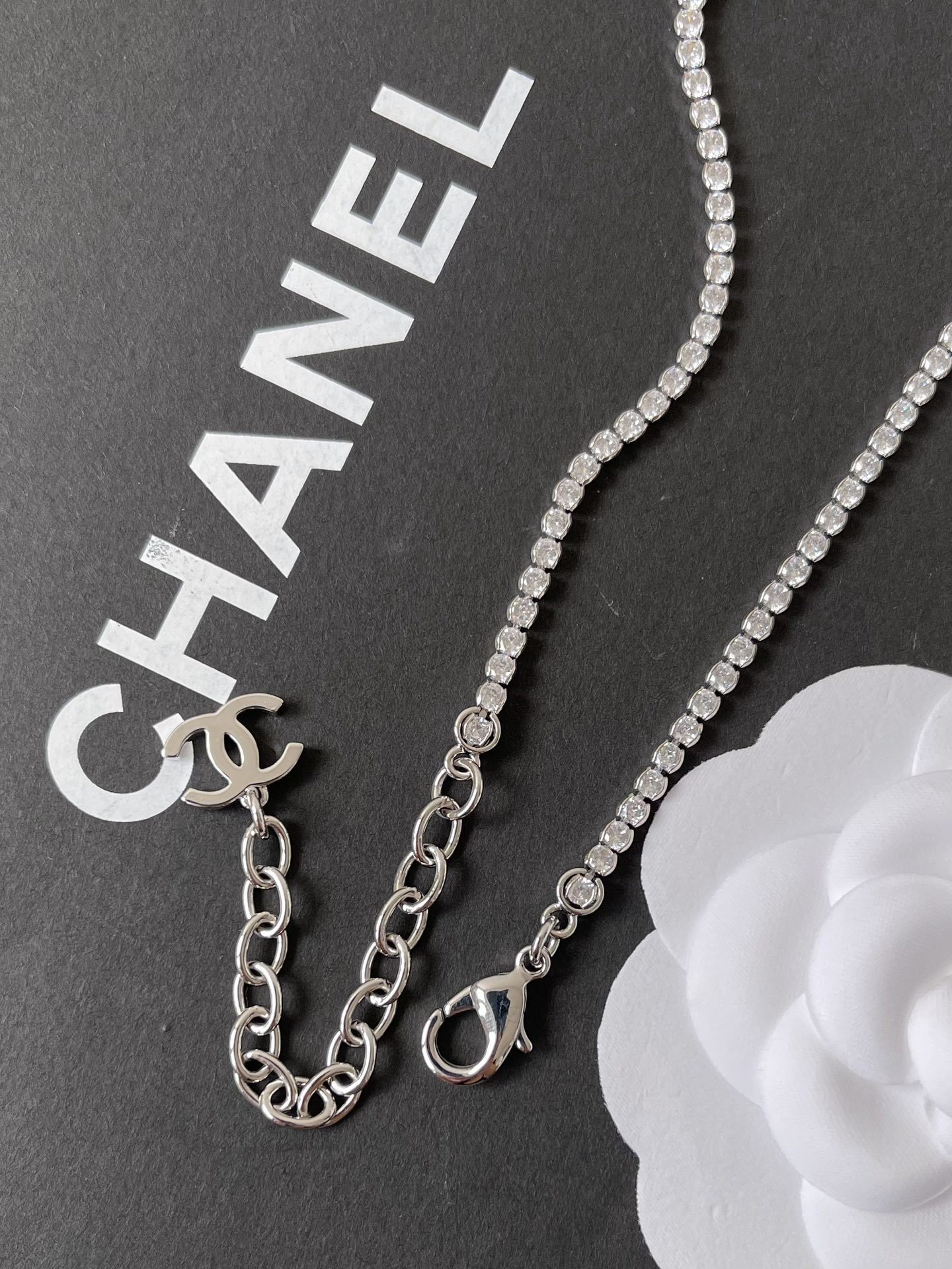 Elegant Silver Pearl Necklace with Sparkling Crystal CC Logo Pendant